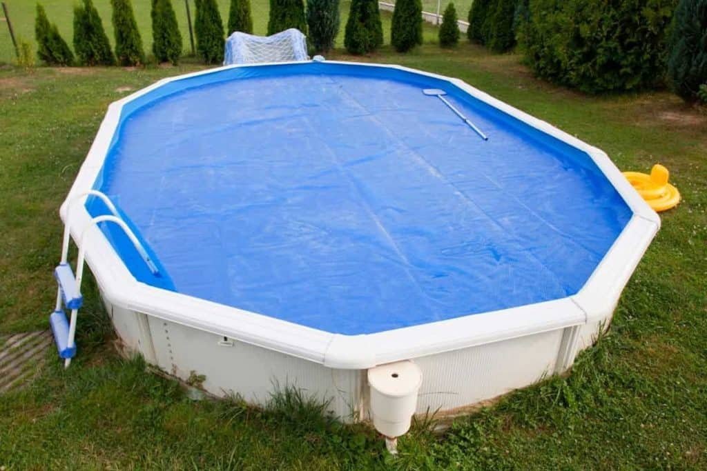 pool with solar pool cover