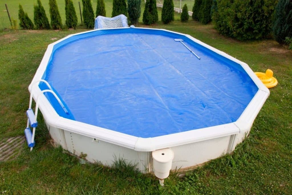 pool with solar pool cover