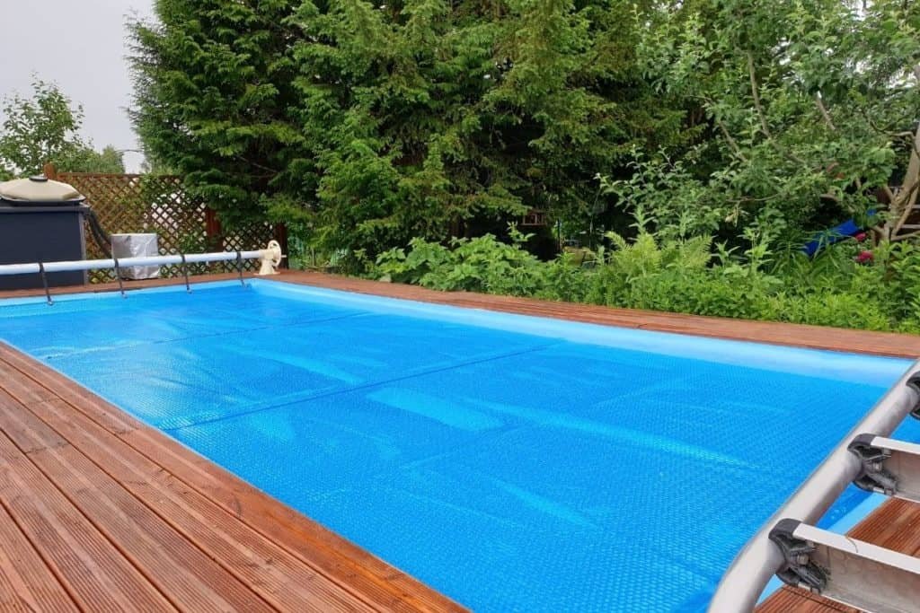 pool with solar pool cover