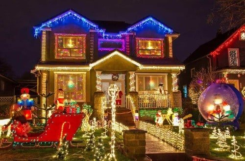 house with solar Christmas lights