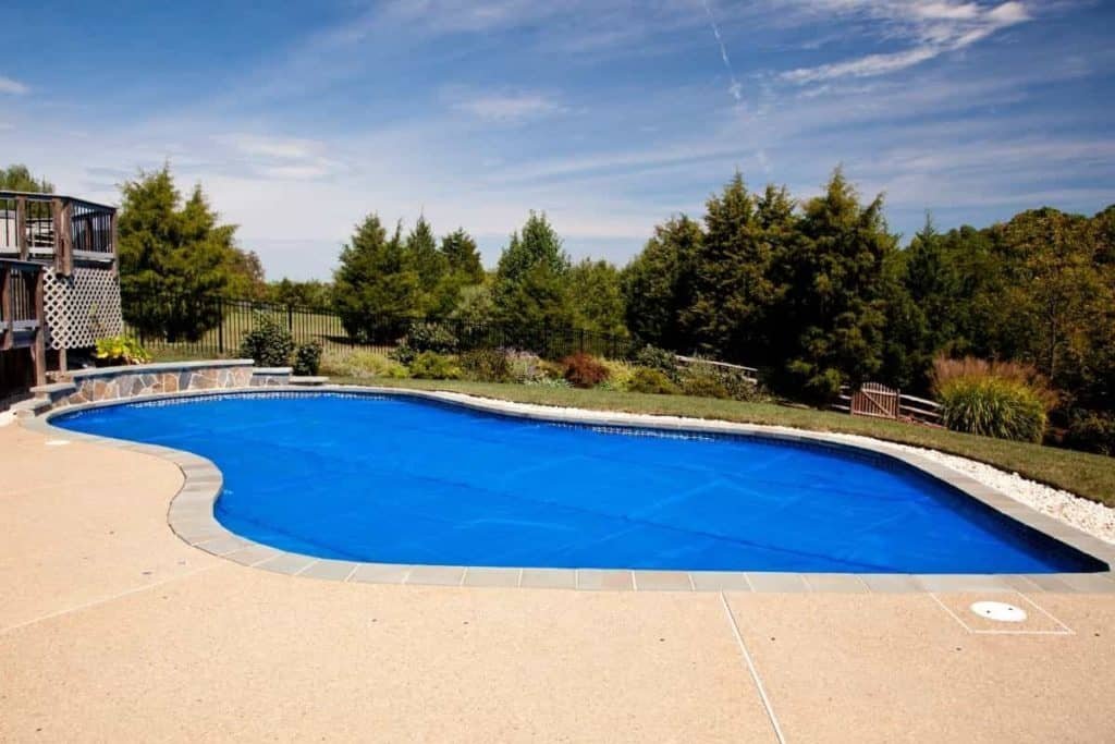 pool with solar pool cover