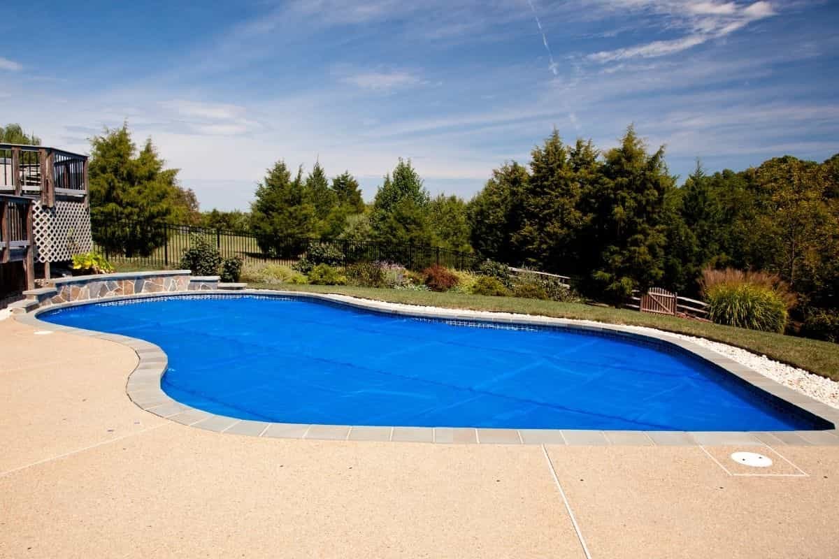 pool with solar pool cover