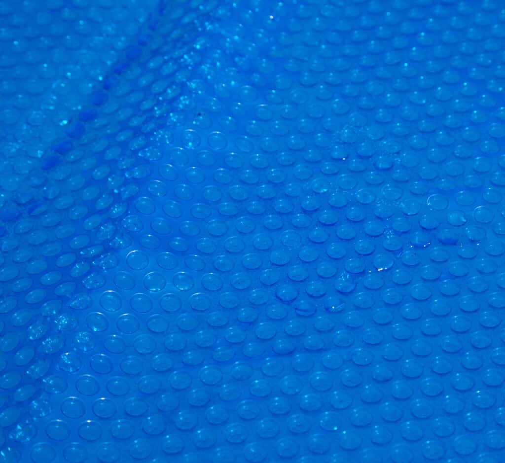 Blue solar pool cover