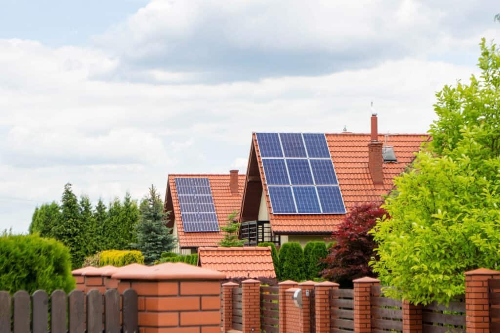 Historic house with modern solar panels on roof